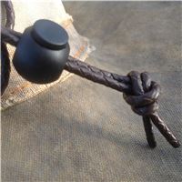 Adjustable button on hat lanyard